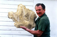 Rex holding giant cast